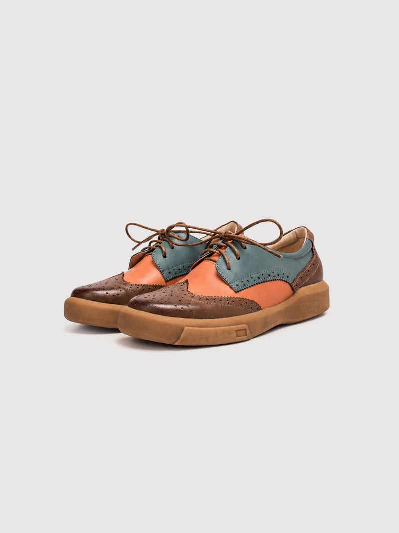 Dandy Block Orange and Teal Leather Brogue Derby Shoes, pair viewed from the front at an angle.