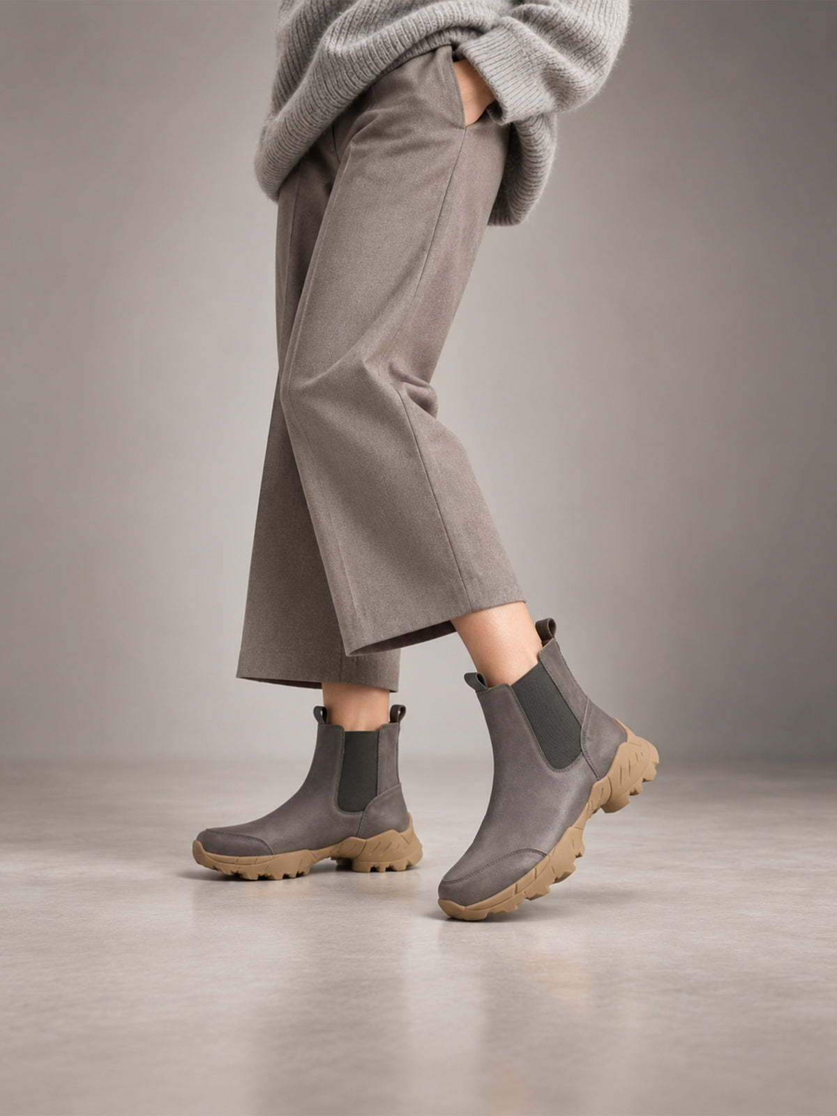 Grey Khaki Ankle Boots, close-up of the shoes being worn.