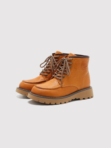 Tan washed leather combat boots, pair viewed from the front at an angle.
