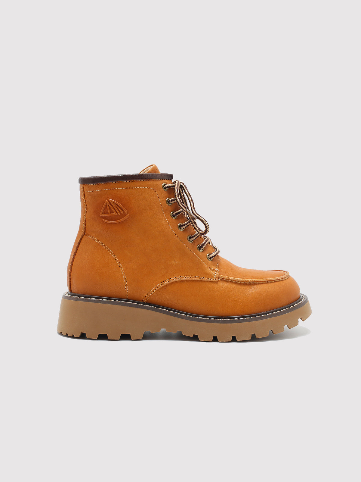Tan washed leather combat boots, side profile.
