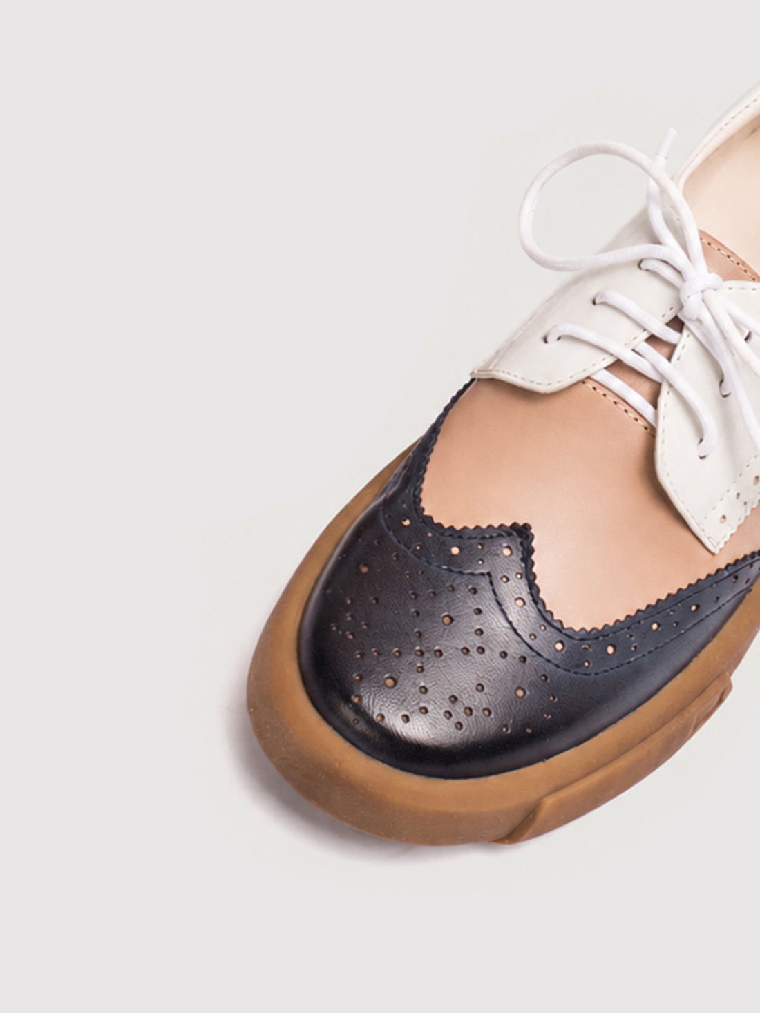 Dandy Block Black and White Leather Brogue Derby Shoes, pair viewed from the front at an angle.