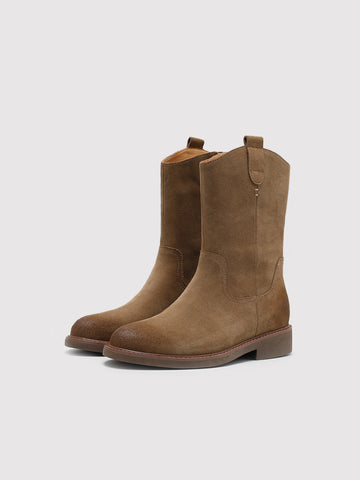 Tan pointed-toe boots, pair viewed from the front at an angle.