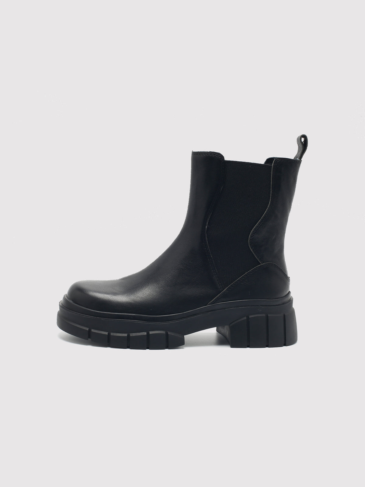 Black shaft boots with lug soles, opposite side profile.