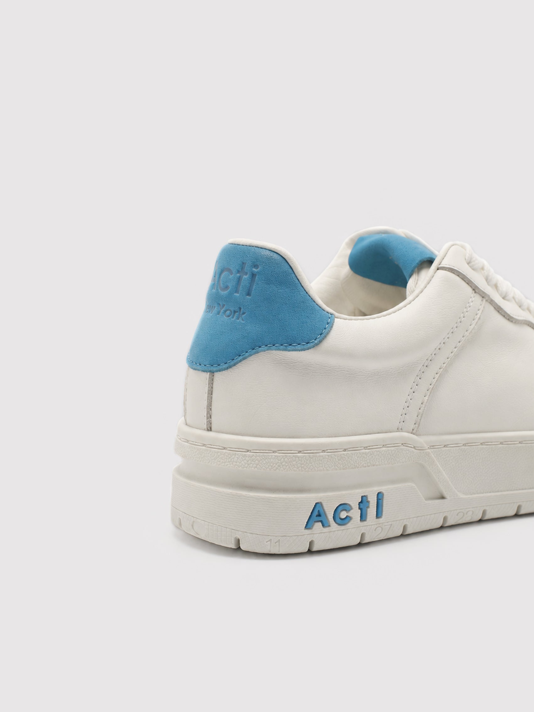 Off-White Leather Low-Top Sneakers with Blue Accents