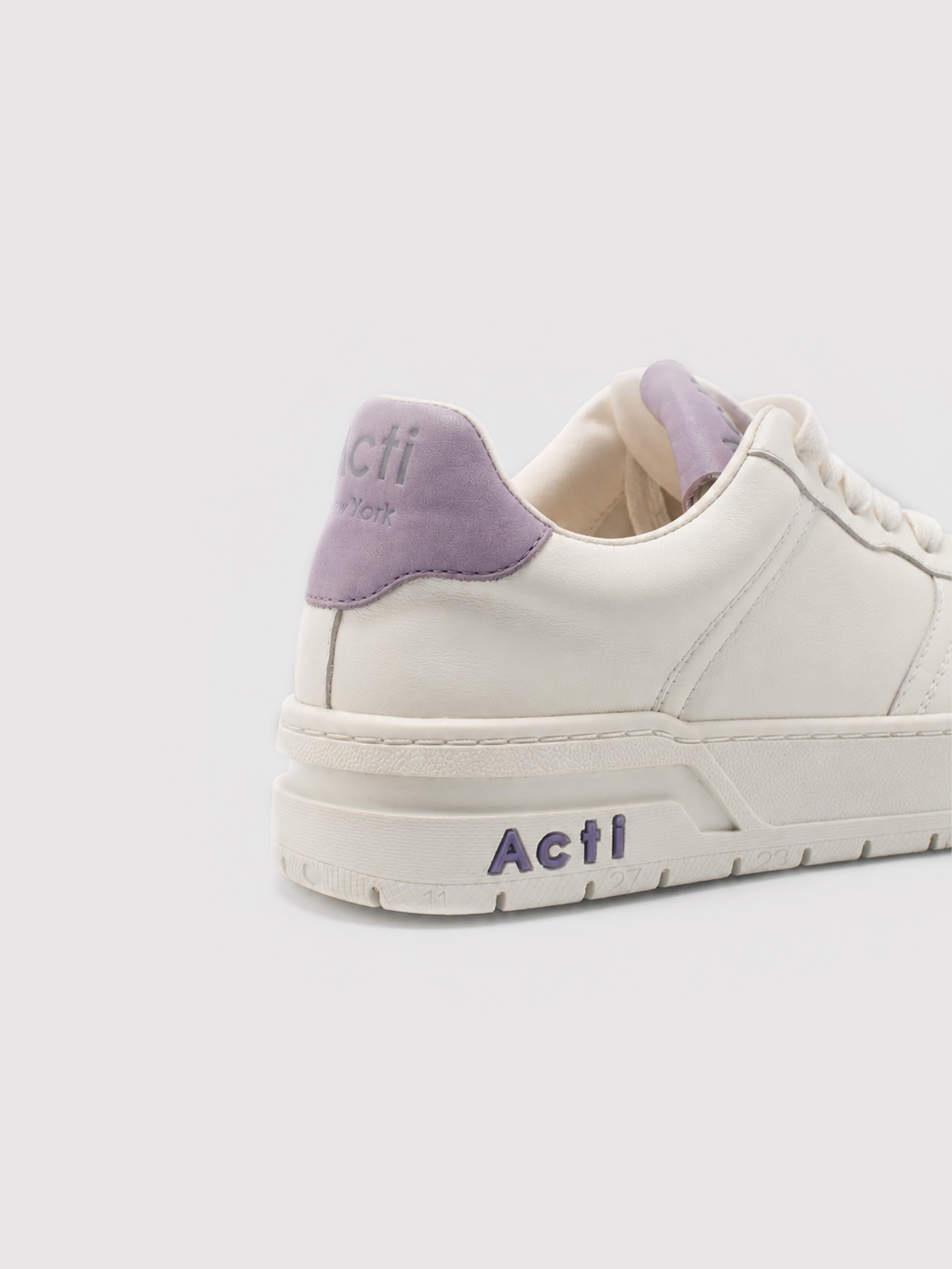 Minimalist Off-White Leather Casual Shoes with Purple Accents