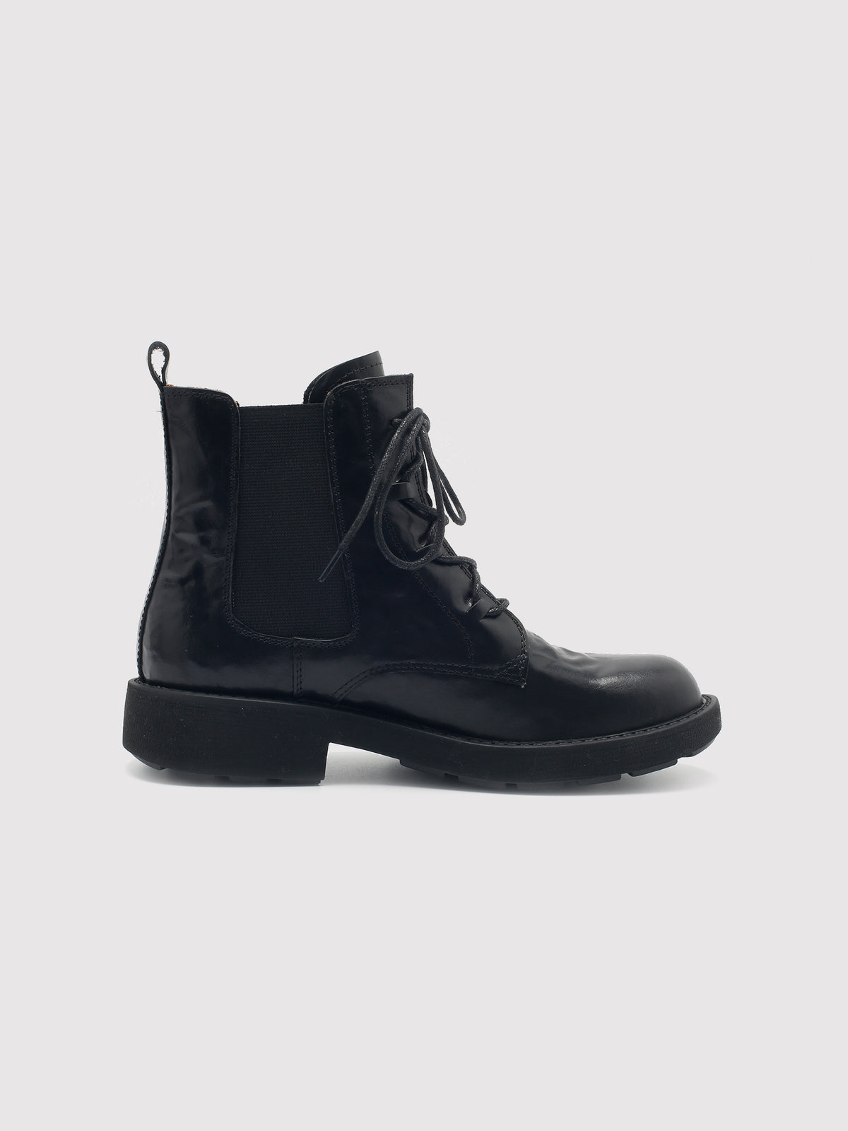 Vegetable-tanned black lace-up boots, opposite side profile.