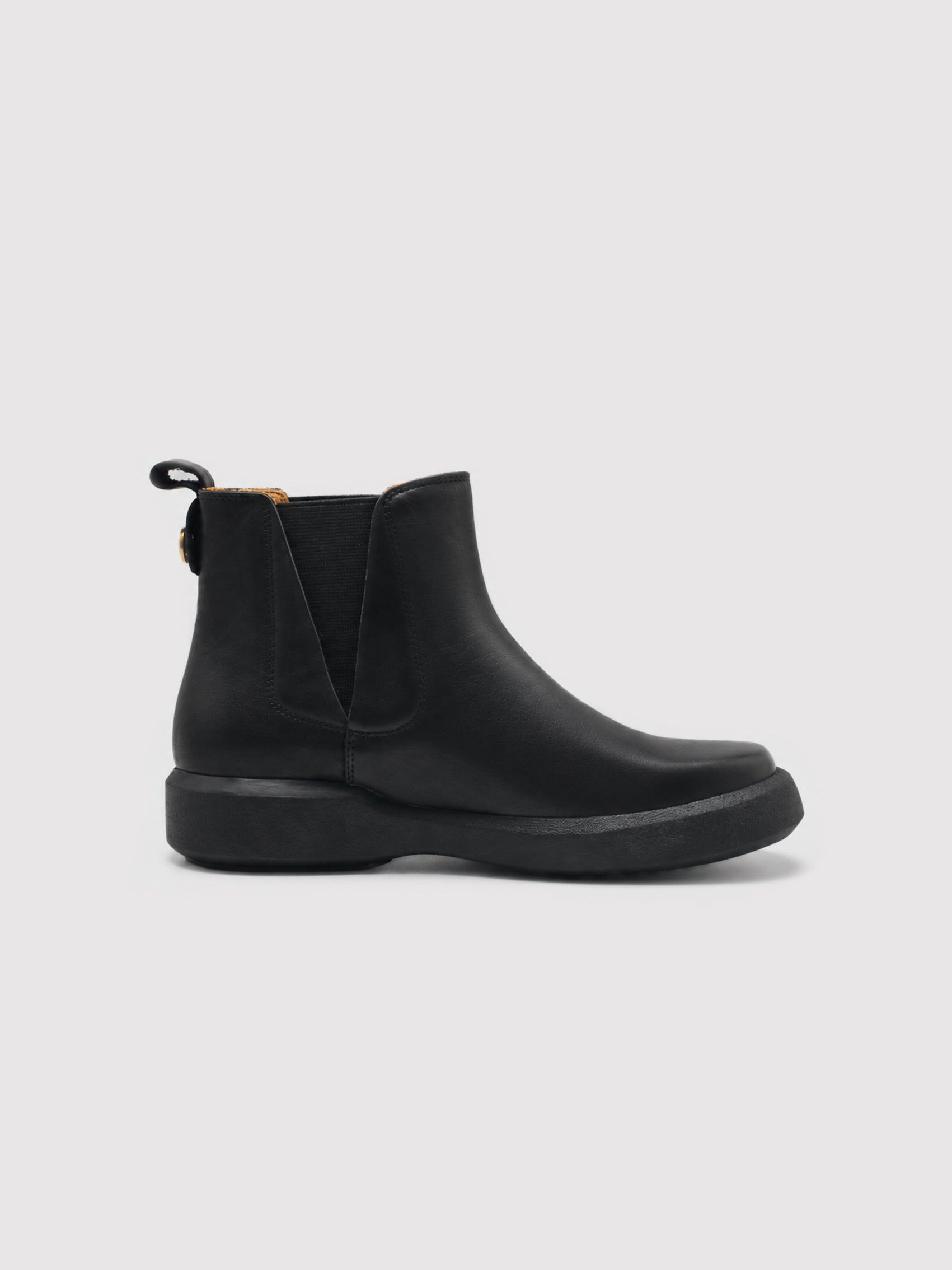Chunky-Sole Black Leather Chelsea Boots with Decorative Gold Accent