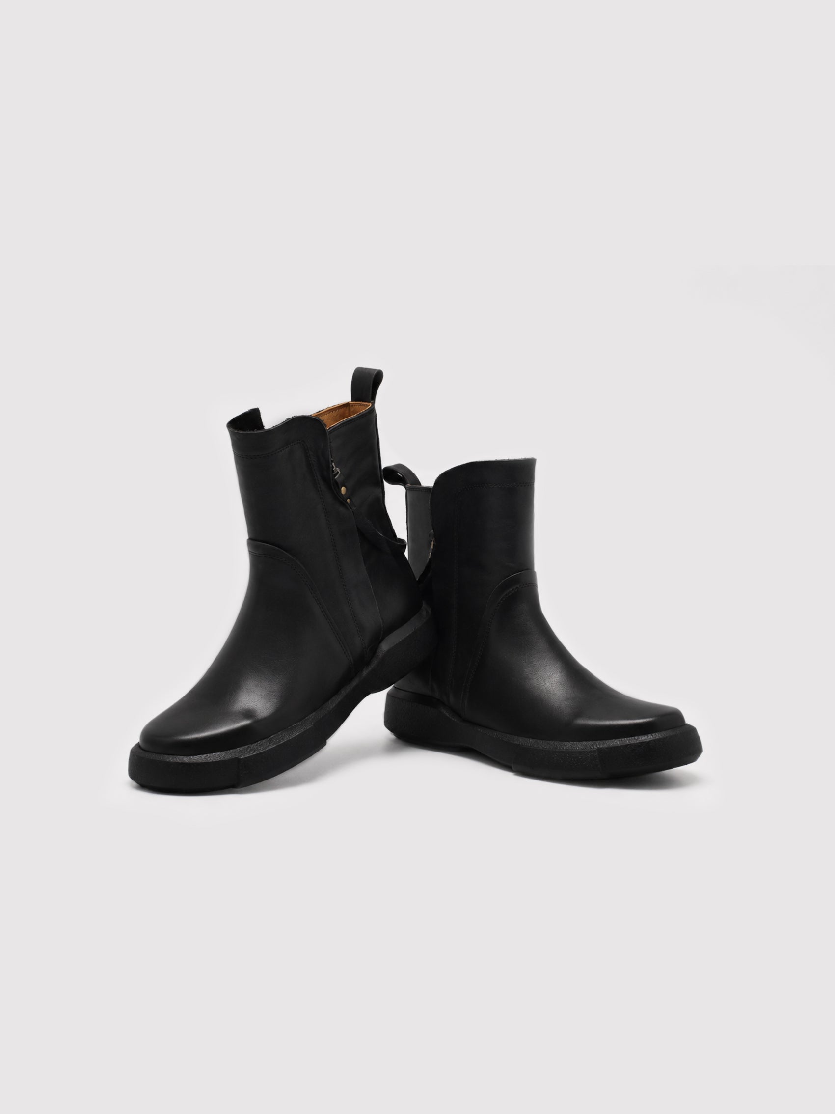 Minimalist Black Leather Ankle Boots with Decorative Strap