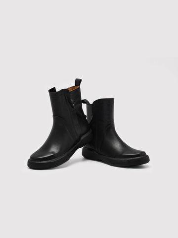 Minimalist Black Leather Ankle Boots with Decorative Strap