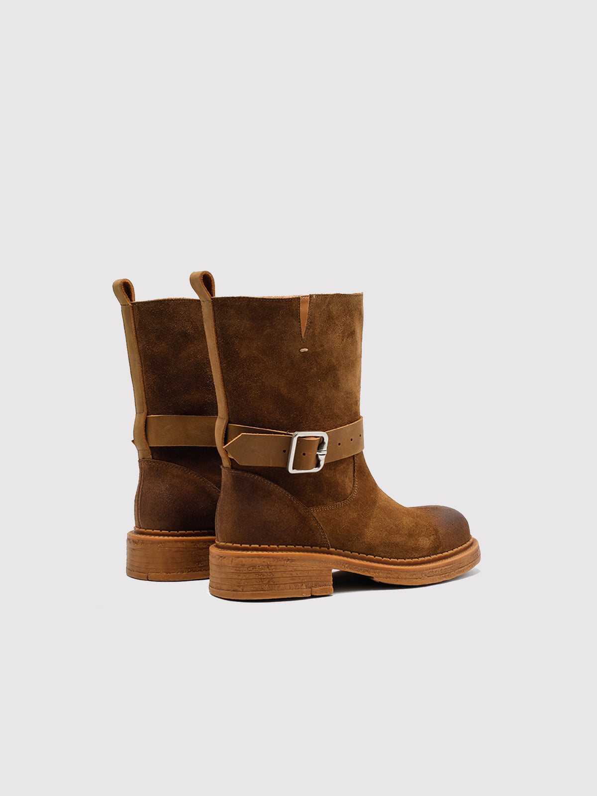 Brown Spanish-inspired buckle boots, pair viewed from the back.