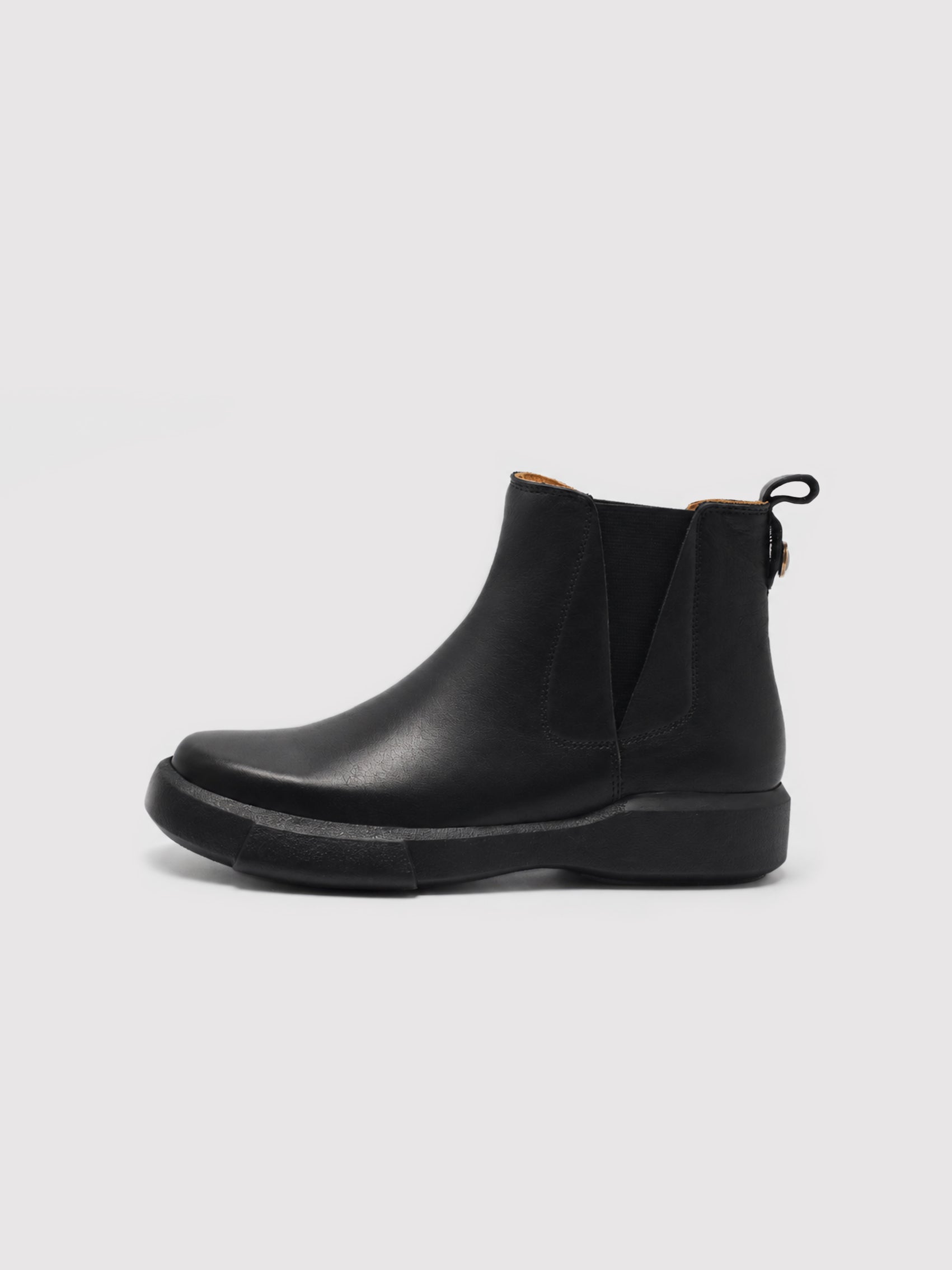 Chunky-Sole Black Leather Chelsea Boots with Decorative Gold Accent