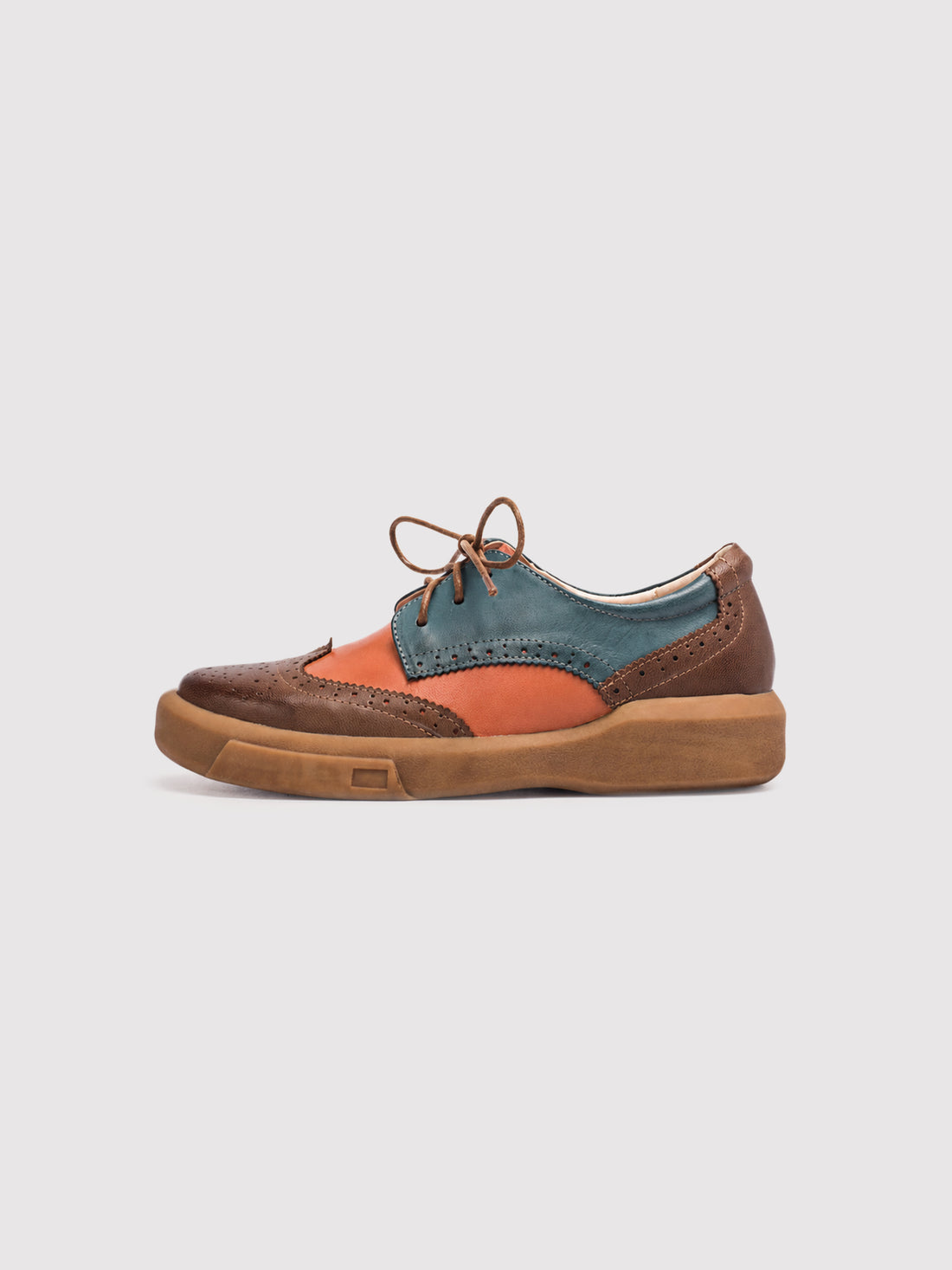 Dandy Block Orange and Teal Leather Brogue Derby Shoes, pair viewed from the front at an angle.