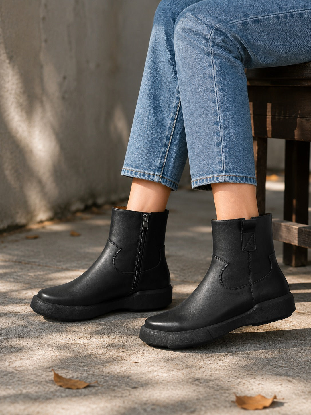 Minimalist Black Leather Ankle Boots with Functional Zipper